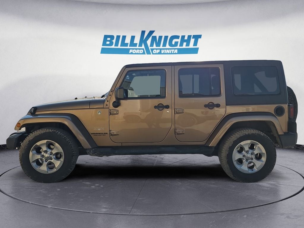 Used 2015 Jeep Wrangler Unlimited Sahara with VIN 1C4BJWEG6FL654359 for sale in Vinita, OK