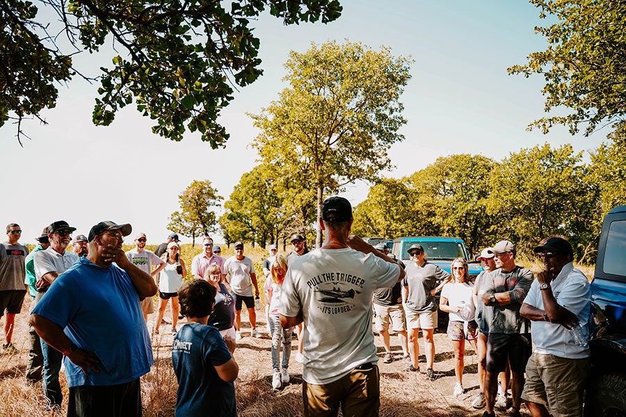 A black and white photo of a Ford Bronco's front grille.