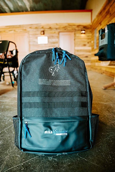 A close-up of a backpack with a Ford Bronco logo on it.